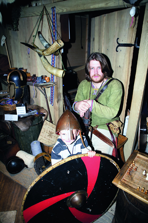 Josh and Liam were delighted they were able to try out authentic helmets and swords!